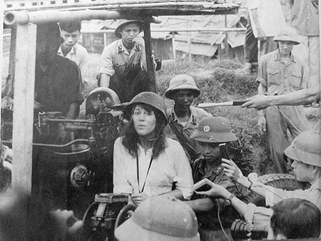 Jane Fonda in all her glory posing in a North Vietnamese anti-aircraft gun emplacement!